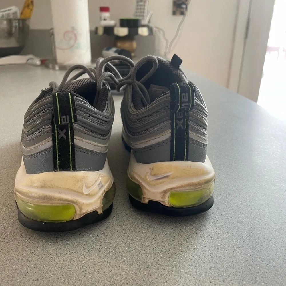 Preloved. Size 5 youth Nike fluorescent swish sneakers.